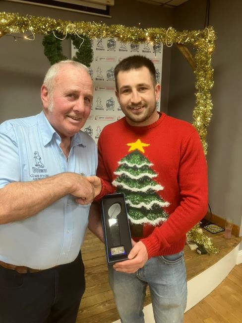 Lewys receives an award from Peter John (Supporters Club)